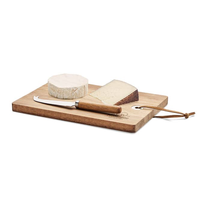 A wooden cheese board with two types of cheese and a cheese knife, featuring a leather accent for hanging.