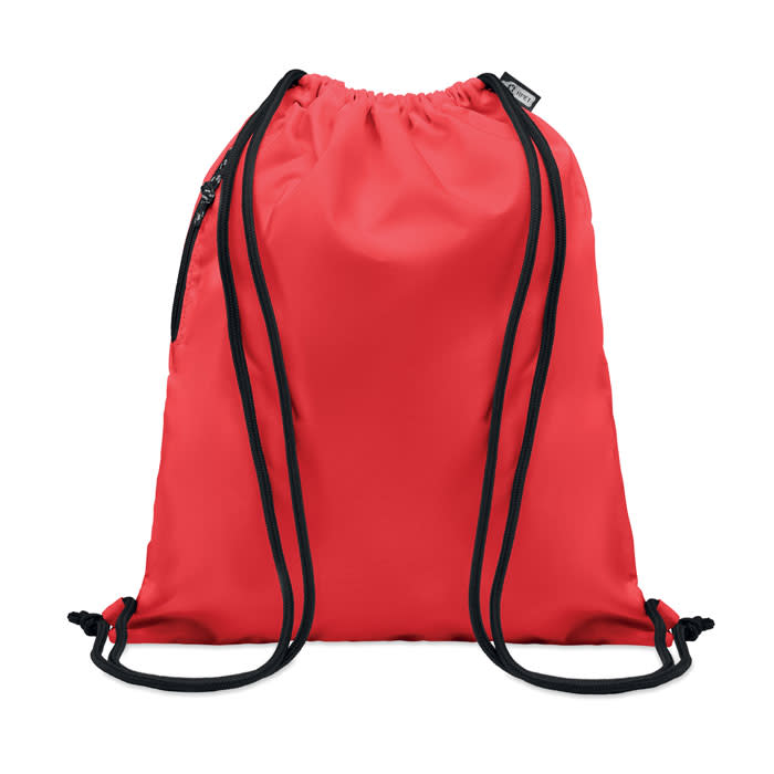 A drawstring backpack in vibrant red with black cords and a zippered pocket. Features a logo on the exterior.