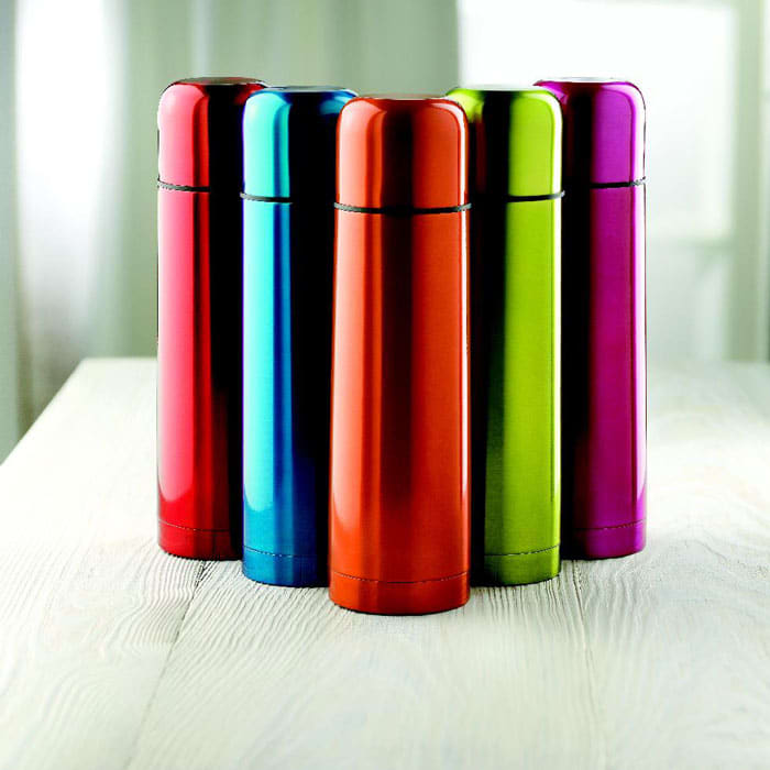 A collection of five colourful drink bottles in red, blue, green, purple, and silver, with a shiny finish and branding.