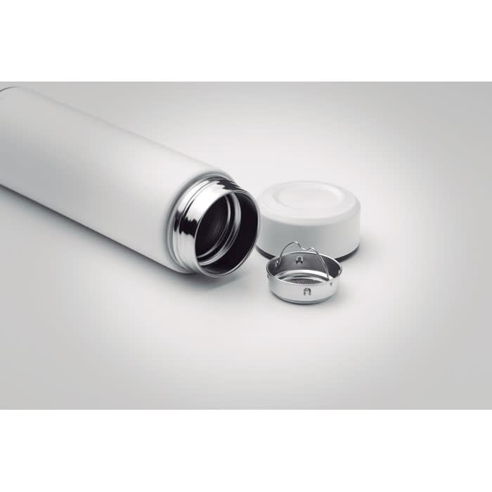 A drink bottle in white with a silver cap and removable lid. It features a sleek, minimalist design.