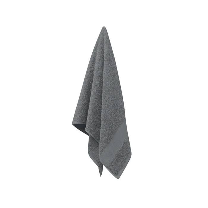 A grey terry towel hanging, featuring a textured surface and a sleek design. It has a subtle logo.