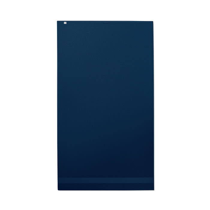 A drink bottle in navy blue with a sleek design and a small logo on the surface.