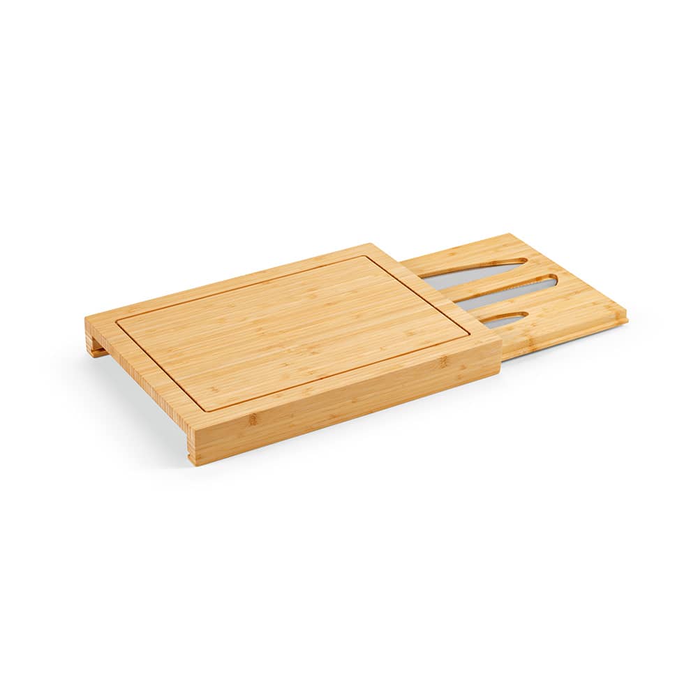 A bamboo cutting board with a sliding section, featuring two kitchen knives. The board has a natural finish.