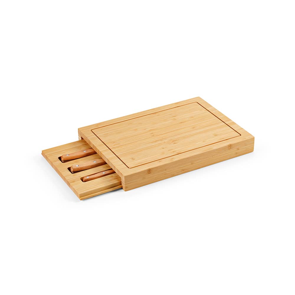 A bamboo chopping board with a sliding compartment containing kitchen knives. The board has a smooth, natural finish.