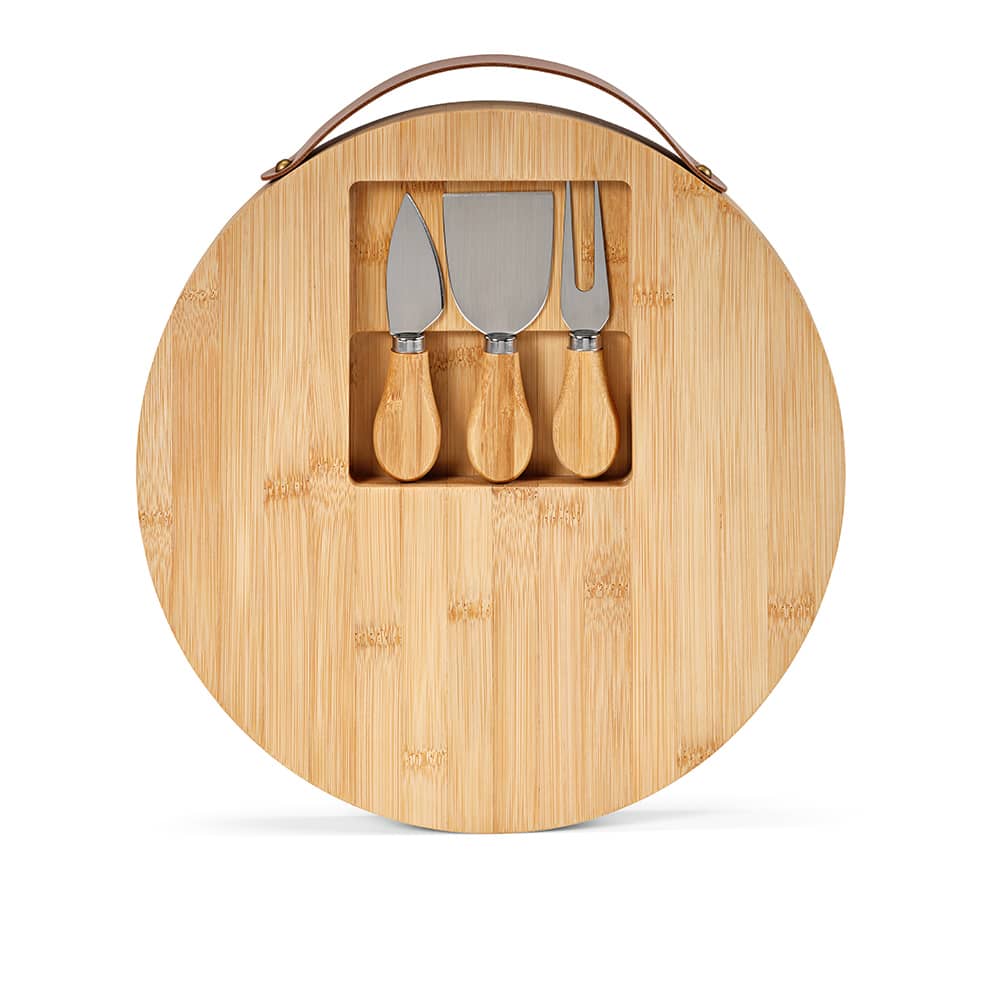 A round bamboo cheese board with a handle, featuring three utensils with wooden handles.