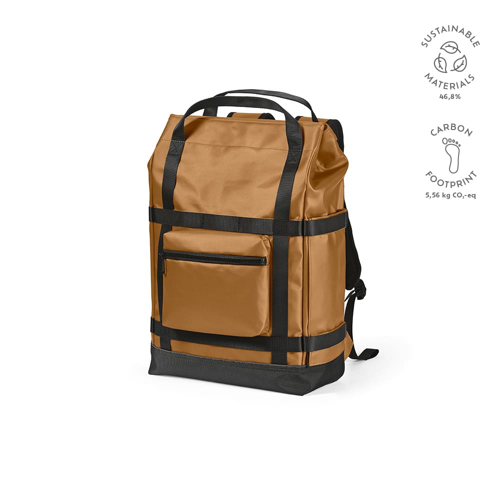 A brown Wellington backpack with a magnetic closure, featuring a front pocket and accommodates a 17" laptop.