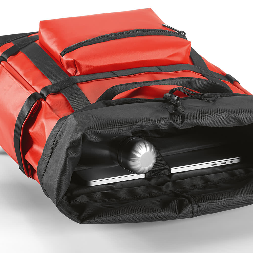 A red Wellington backpack with magnetic closing, featuring a compartment for a 17" laptop and an outer pocket.