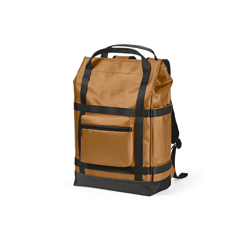 A brown Wellington Backpack with magnetic closure, featuring a front pocket and adjustable straps, fits a 17" laptop.