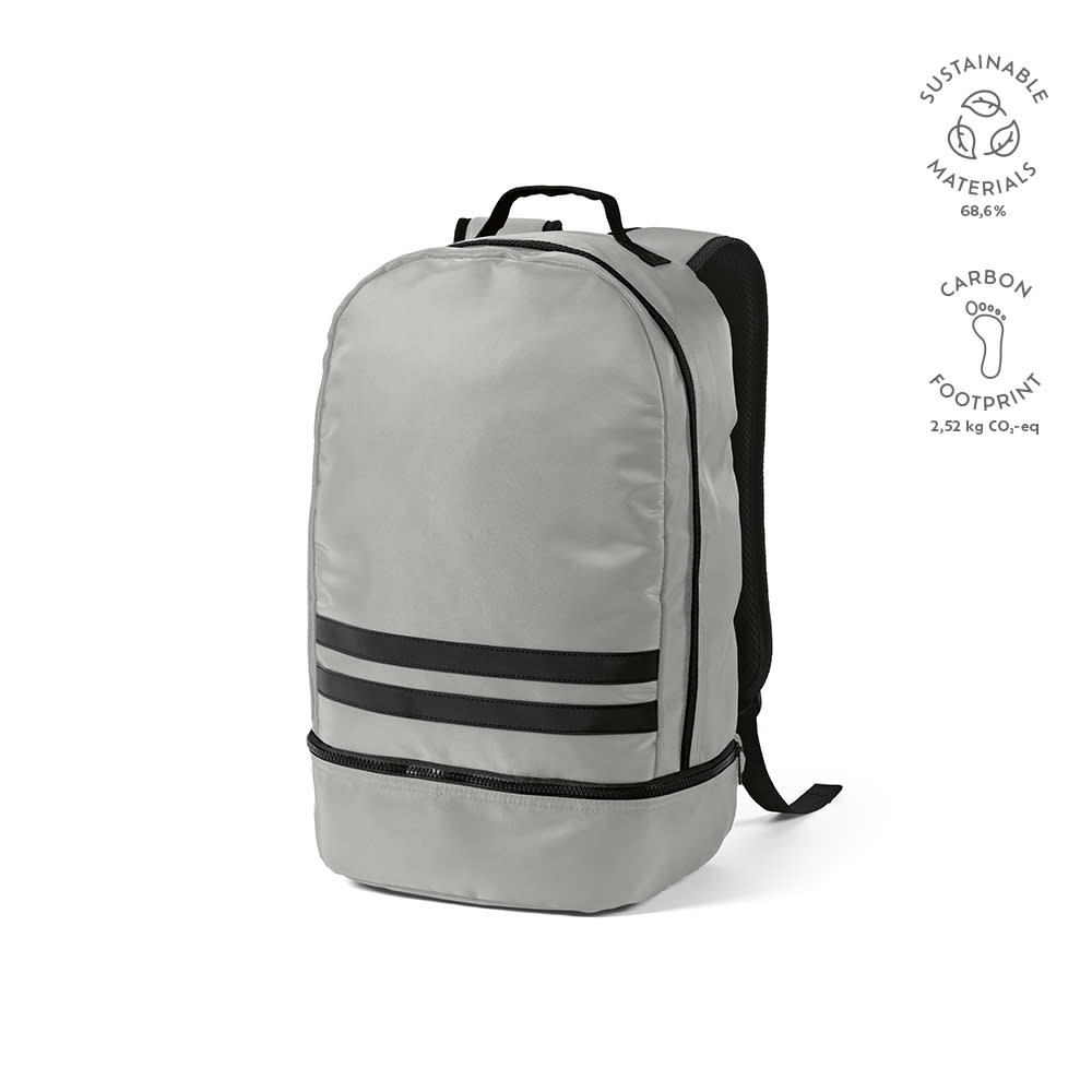 A grey backpack with reflective front strips. It features a black back and has a logo on the side.