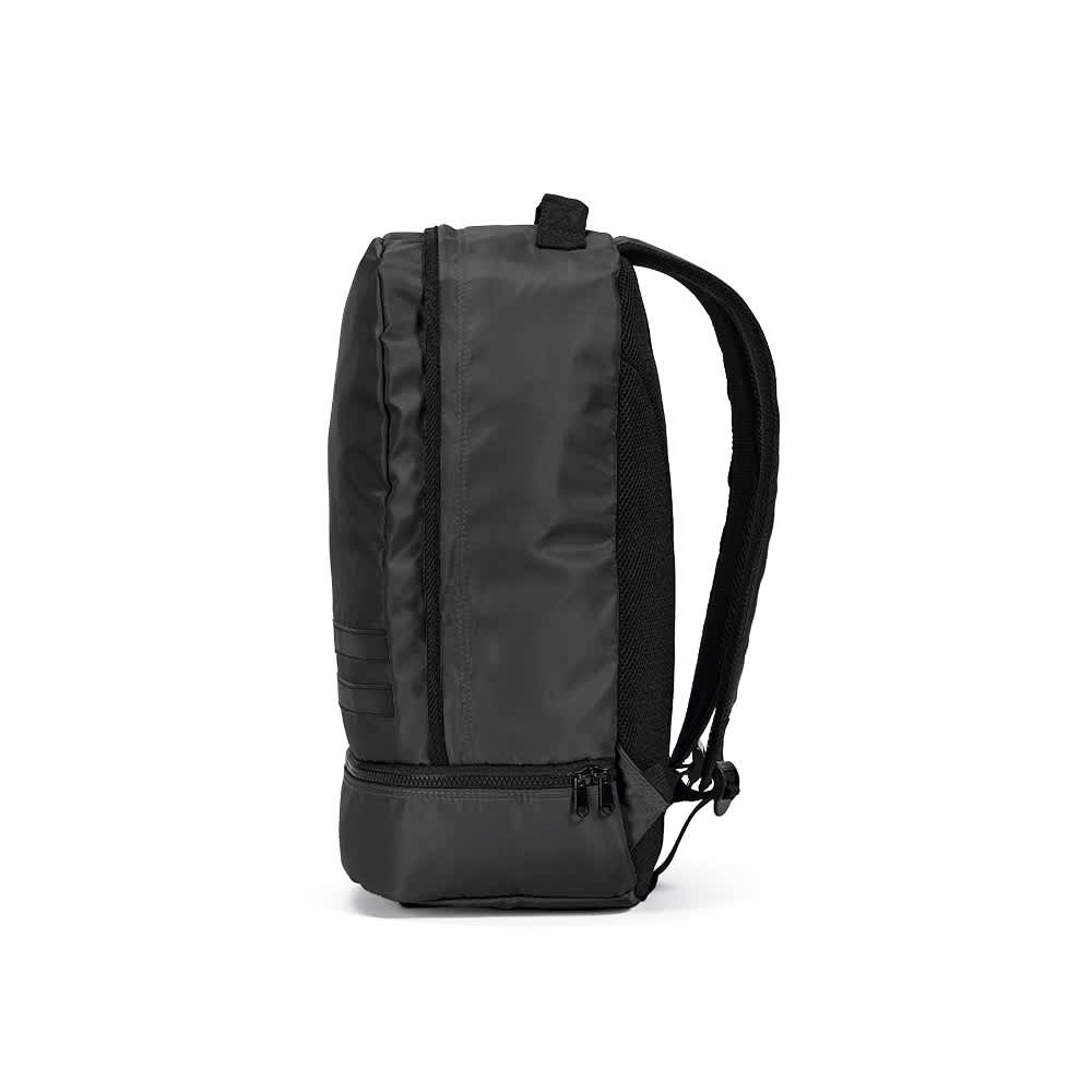 A black Buenos Aires backpack with reflective front strips, featuring padded shoulder straps and a zipper compartment.