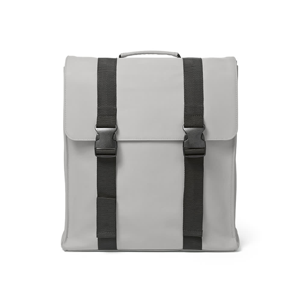 A grey backpack with black straps and buckles, designed to fit a 17" laptop, featuring a branded logo.