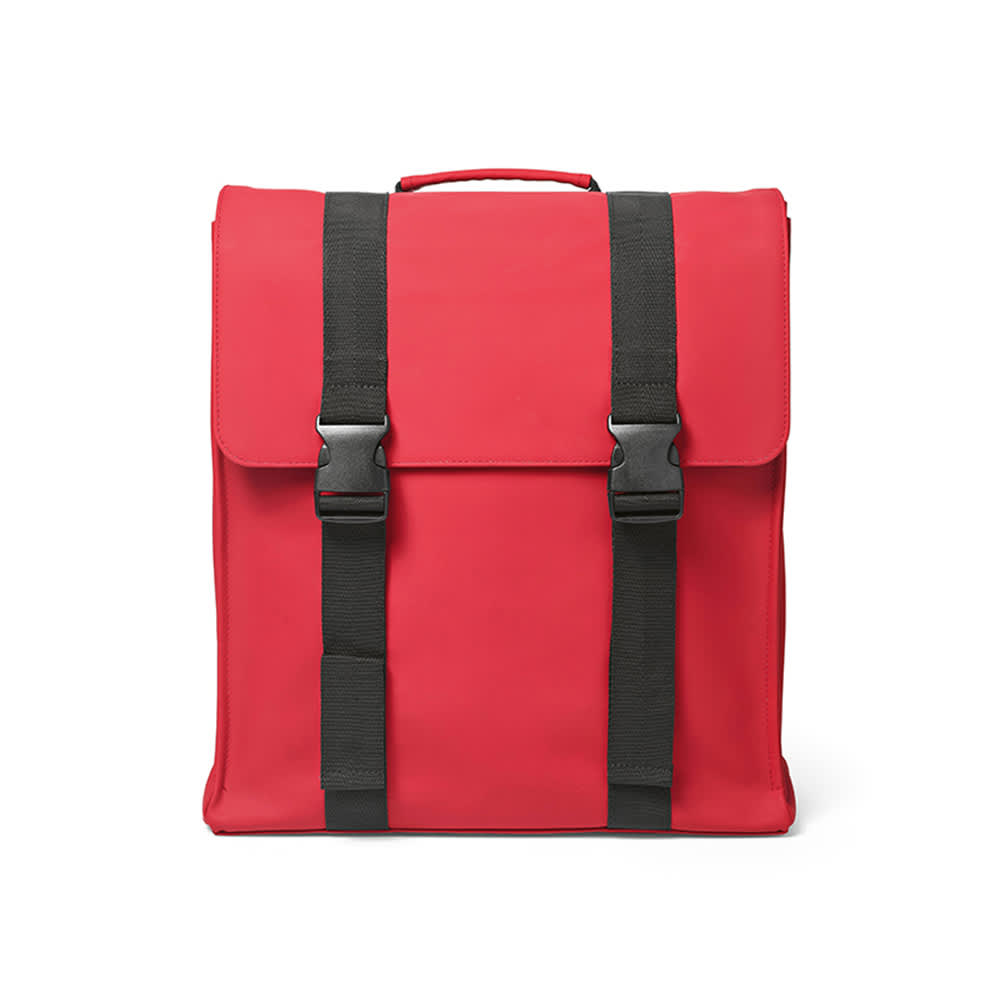 A red backpack with black straps and buckles, designed to fit a 17" laptop. It features a logo.