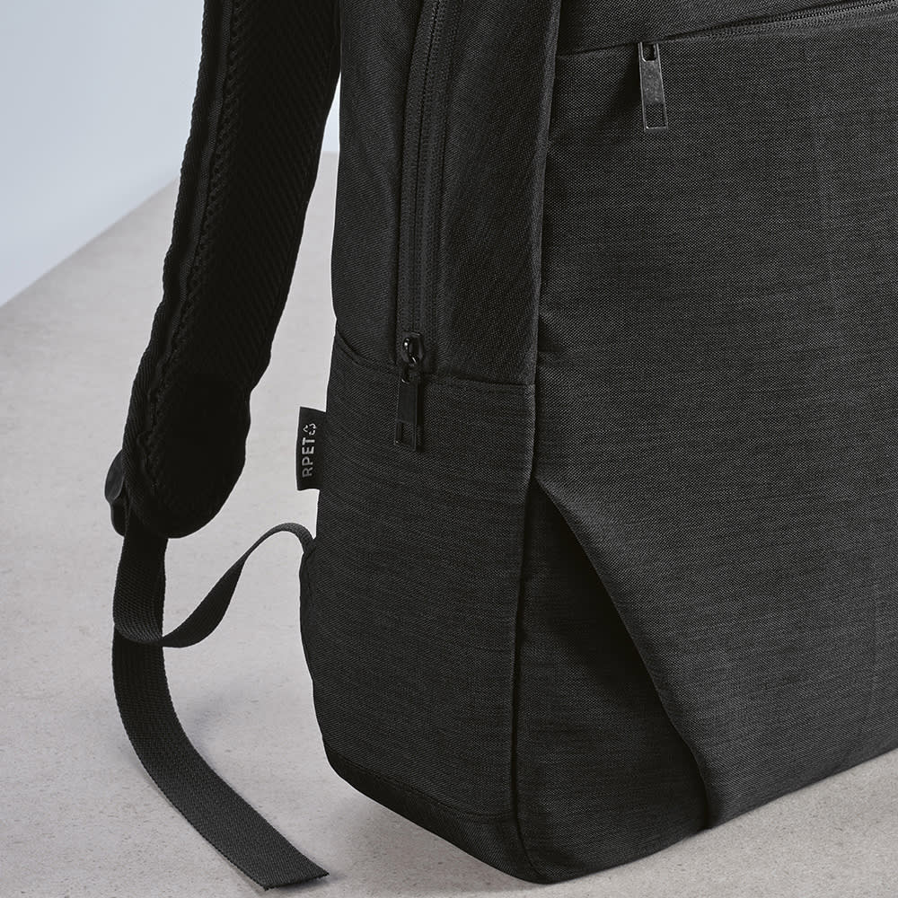 A black Vilnius Backpack with a front pocket, made from rPET, featuring adjustable straps and a sleek design.