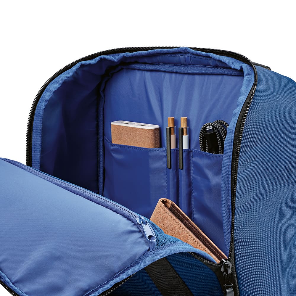 A blue backpack interior with compartments for a laptop, notebook, pens, and other accessories. It has a branding logo.