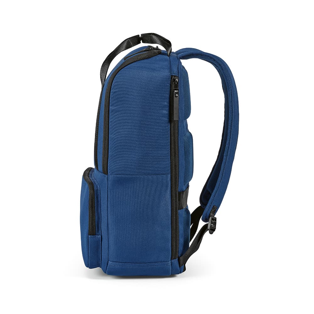 A blue Bucharest Backpack 18L rPET featuring a front pocket and adjustable straps. Includes space for a 15.6" laptop.