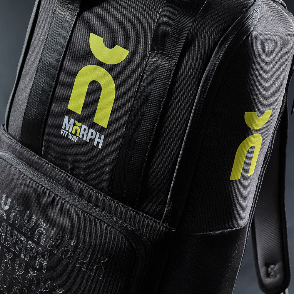 A black backpack with a front pocket, featuring branding logos in bright yellow. Suitable for carrying a 15.6" laptop.