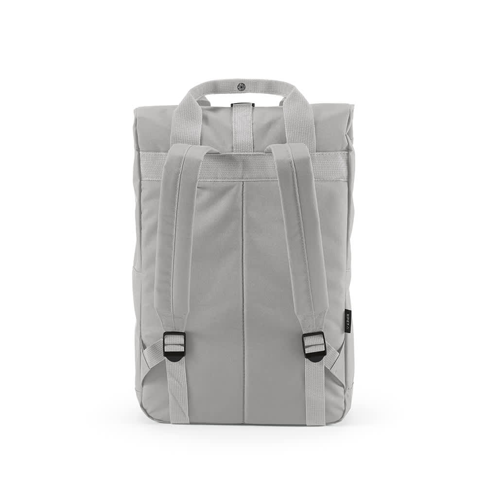 A grey roll-top backpack with buckle closure and adjustable straps, featuring a logo.