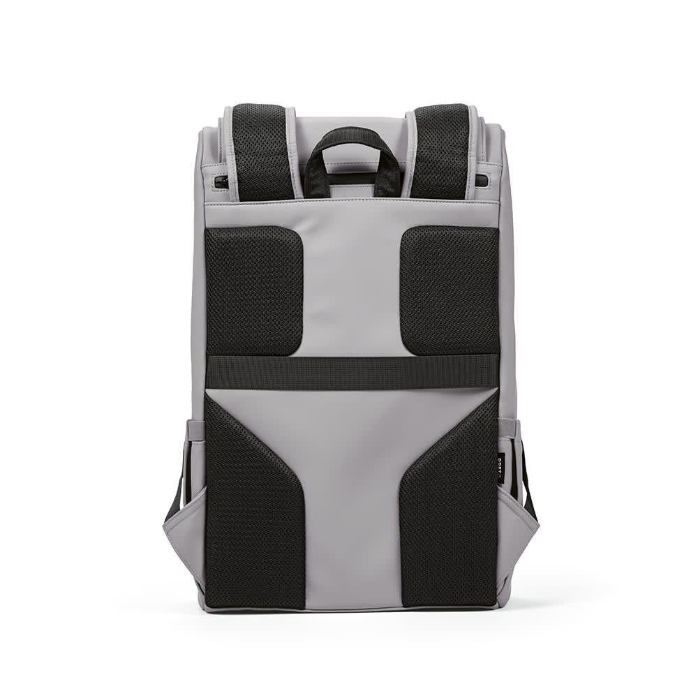 A grey and black backpack with padded straps and a top handle, designed to fit a 15.6" laptop. Features a logo.