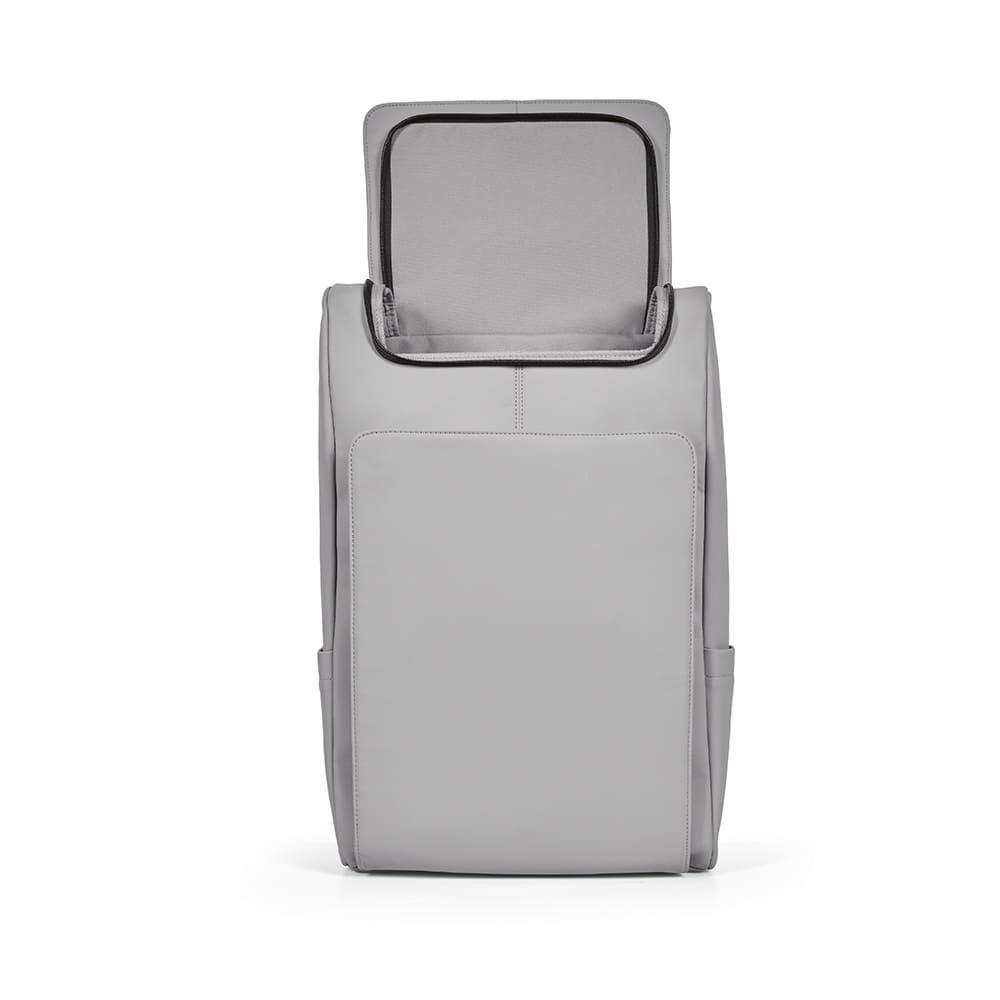 A grey backpack with a top opening, featuring two side pockets and a logo. It fits a 15.6" laptop.