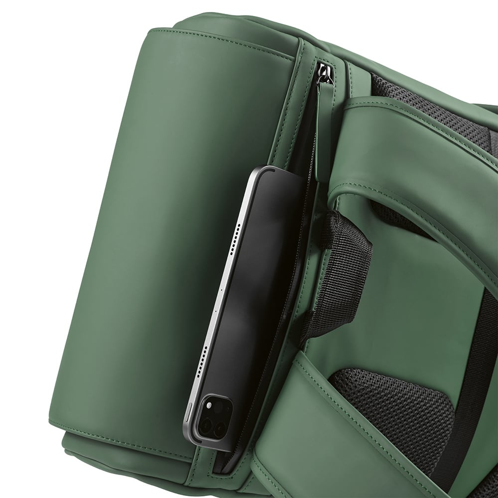 A green Lisbon Backpack 20L rPU, featuring a zippered pocket with a black device. Also includes a logo.