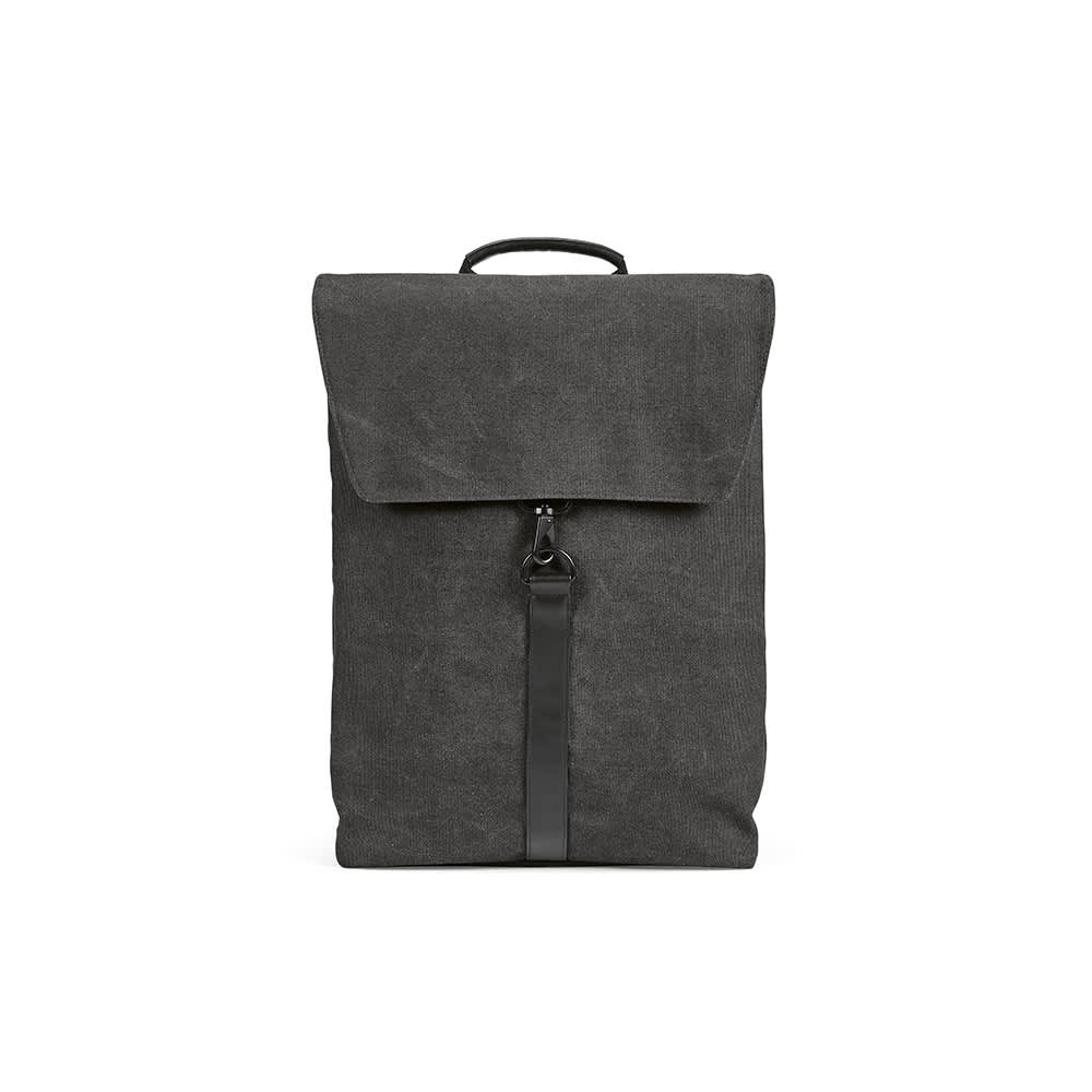 A dark grey backpack with a hook closure, featuring a strap and a handle, designed to fit a 17" laptop.