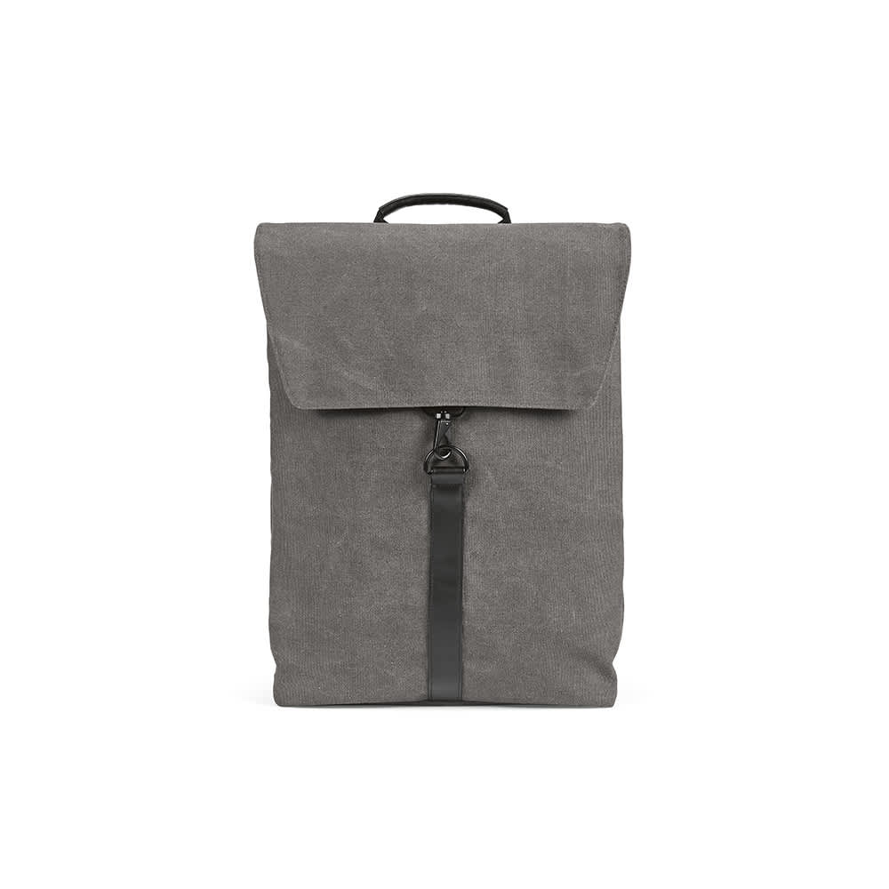 A grey backpack featuring a hook closure, designed to fit a 17" laptop, with a minimalist style.
