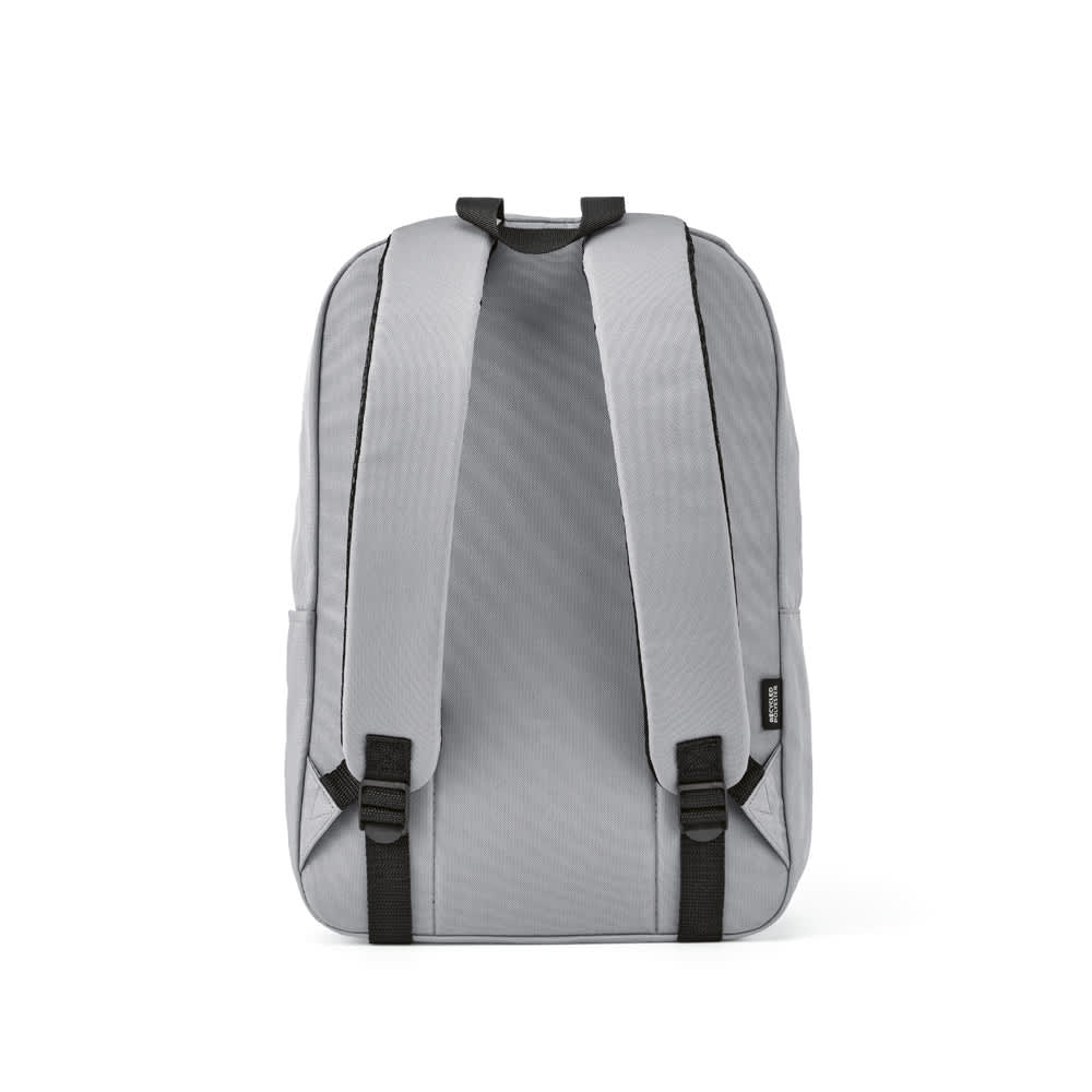 A grey backpack with black straps, featuring padded shoulder straps and a logo. Suitable for carrying a 15.6" laptop.