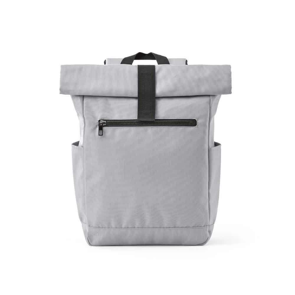 A grey roll-top backpack with a velcro closure and a zippered front pocket. It has a logo displayed.