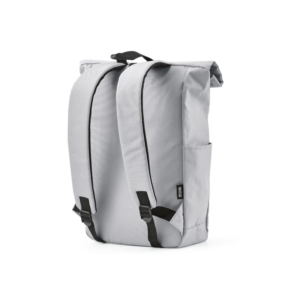 A grey roll-top backpack with a velcro closure and two adjustable straps on the back. It features a side pocket and a logo.