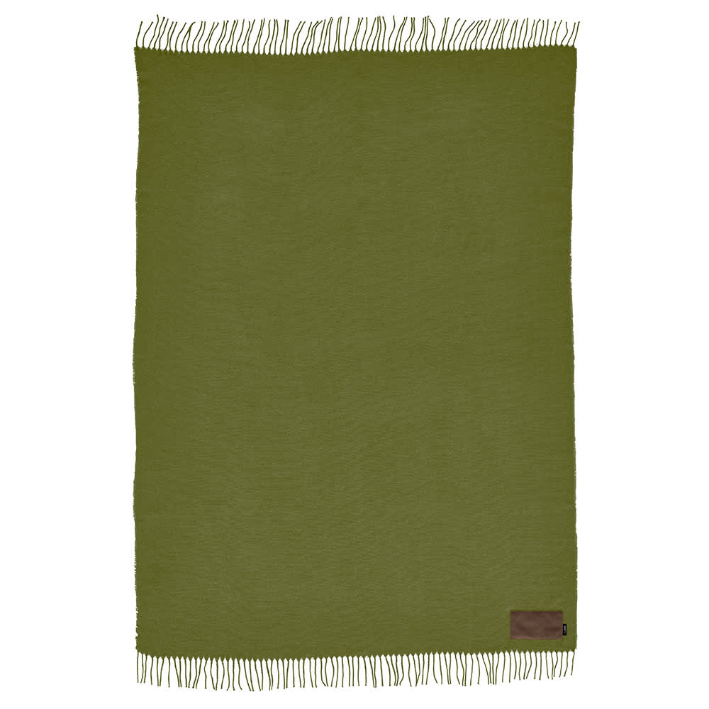 A green Lichtenstein blanket made from recycled PET, featuring fringed edges and a patch for customisation.