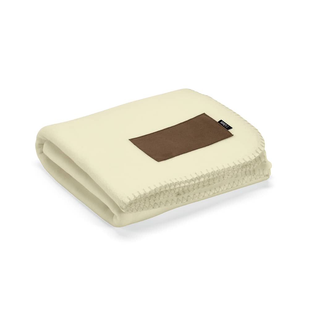 A folded cream blanket made from rPET, featuring a customisable brown patch and a small logo.