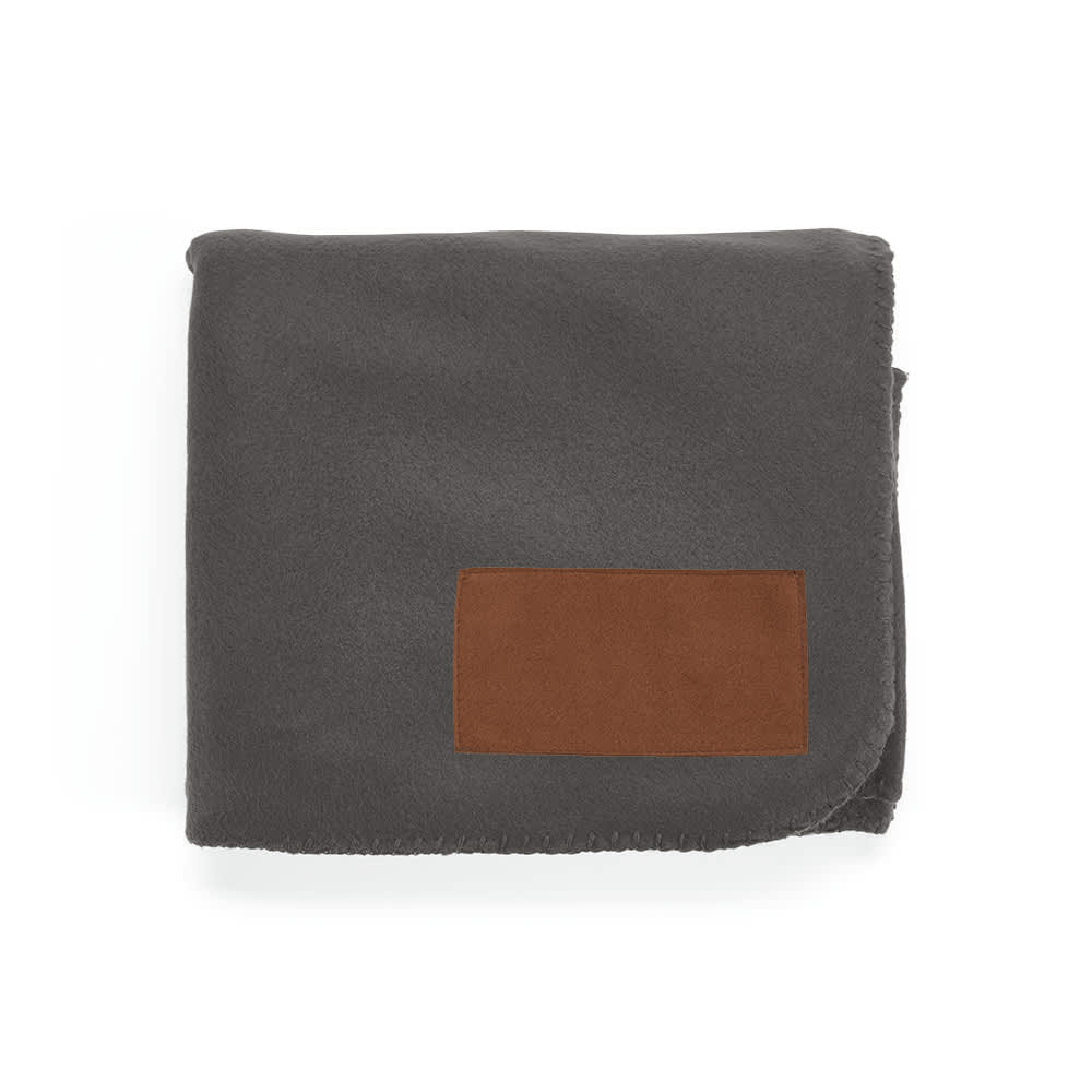 A grey blanket made from rPET material, featuring a customisable brown patch.