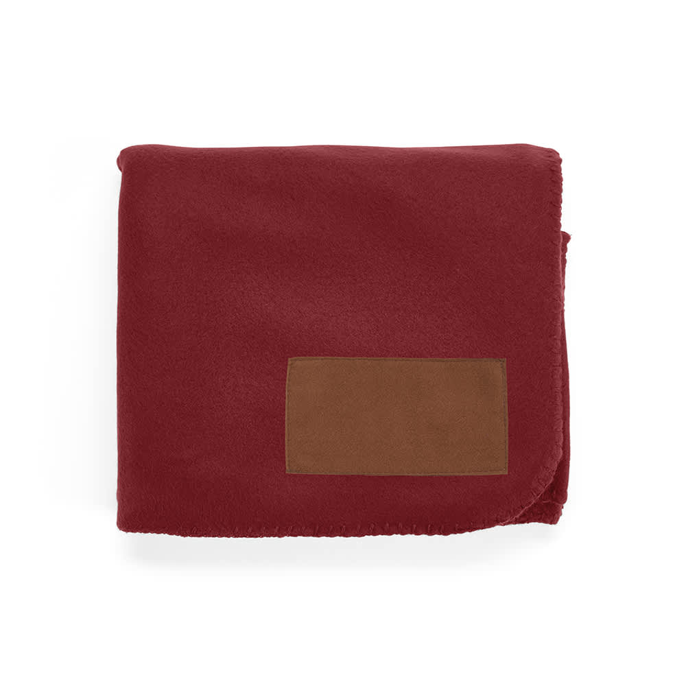 A maroon blanket made from rPET fabric, featuring a customisable brown patch.