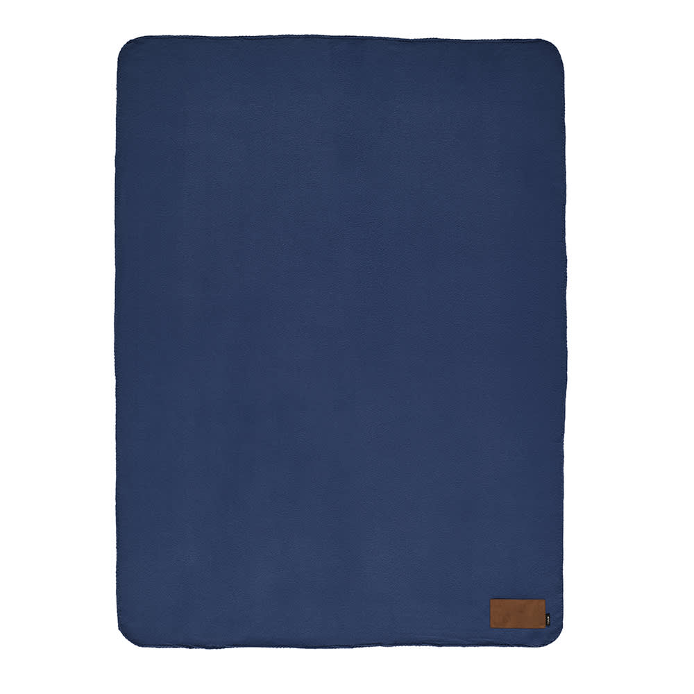 A navy blue blanket made from rPET, featuring a customisable patch and a branding label.