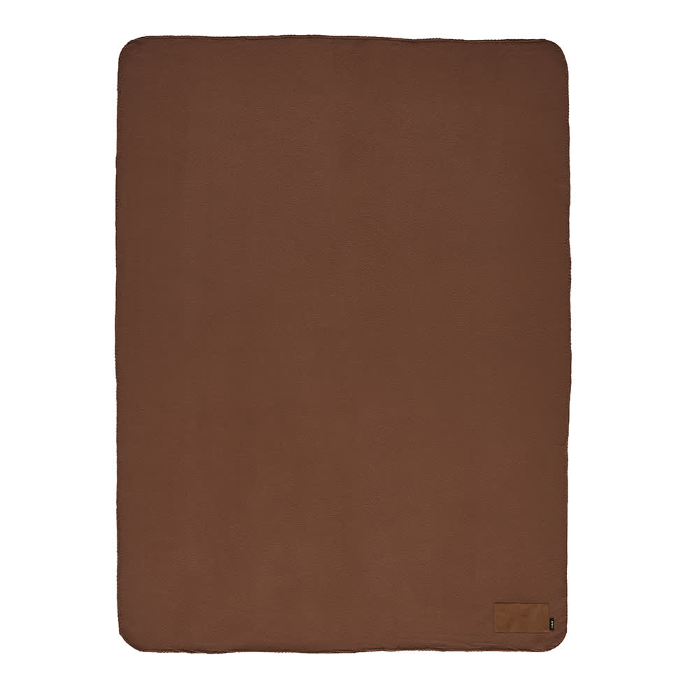 A brown blanket made from rPET, featuring a customisable patch and a logo in the corner.