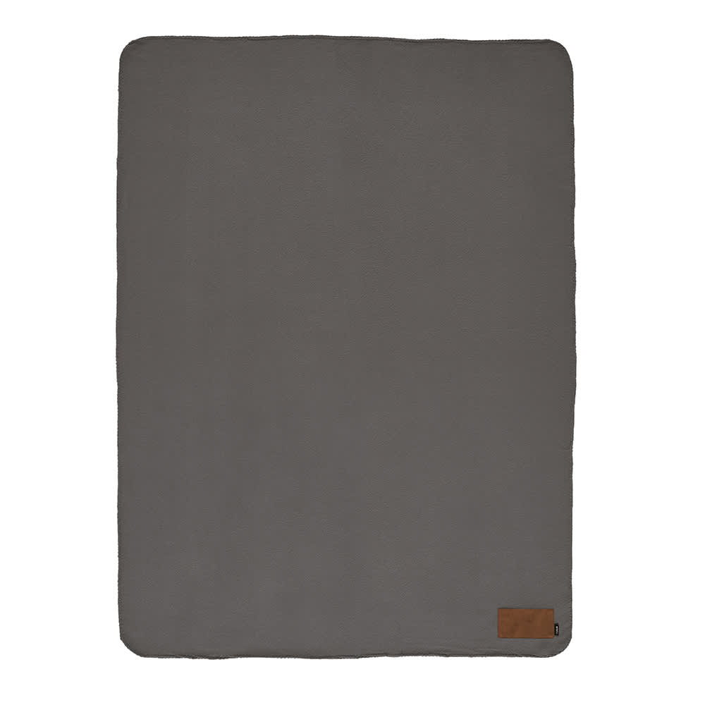 A grey blanket made from rPET material, featuring a customisable patch and a small branding label.