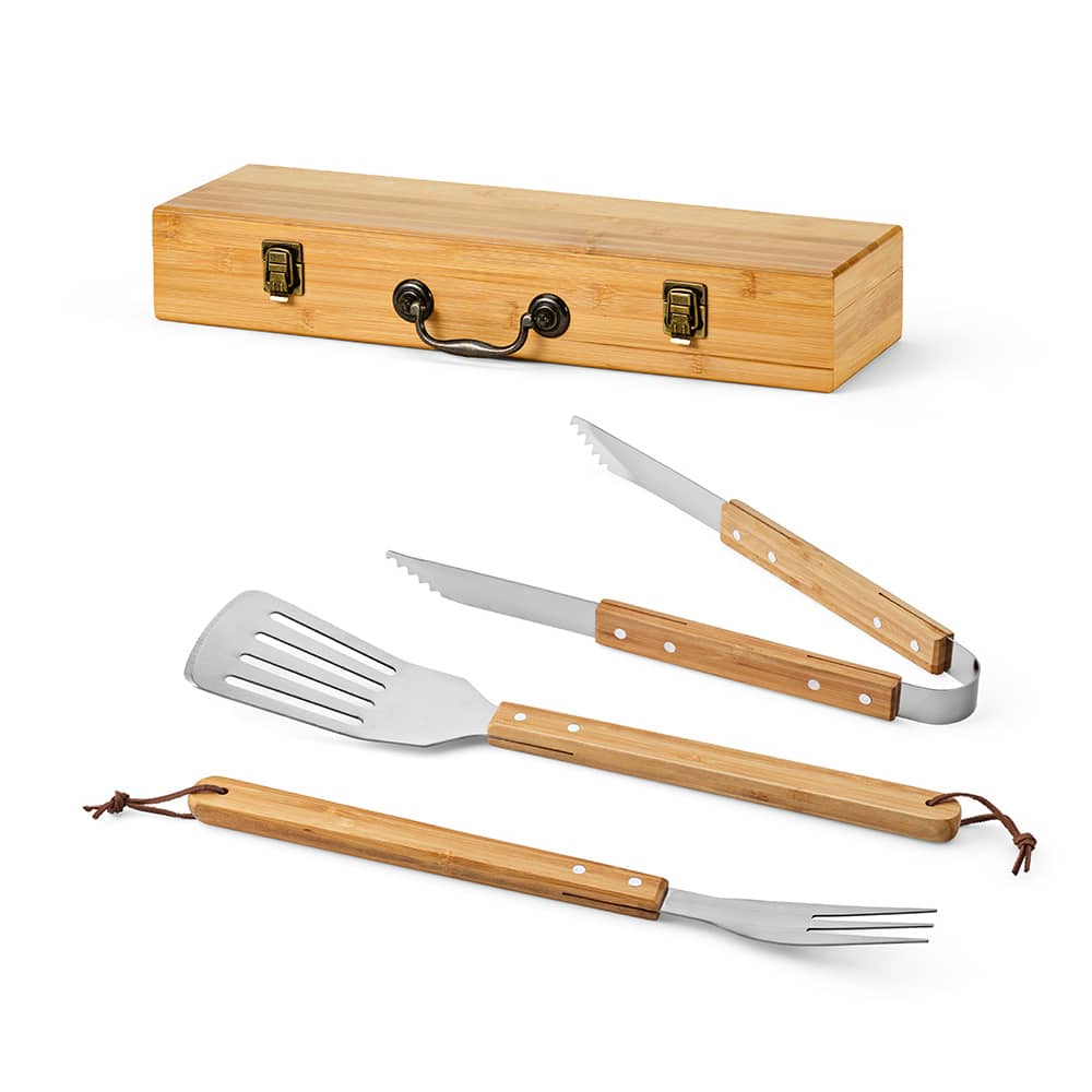 A bamboo barbecue set featuring a case, stainless steel spatula, fork, and tongs with bamboo handles.