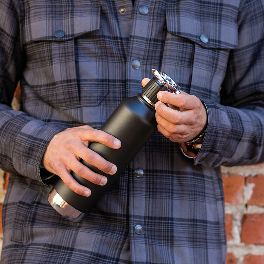 A drink bottle with a sleek black finish, double wall design, and a wheel-shaped lid, featuring a logo.