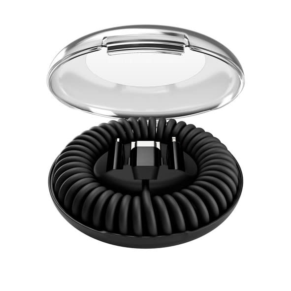 A black charging cable coiled inside a transparent, round organiser with a lid. There is a logo visible on the organiser.