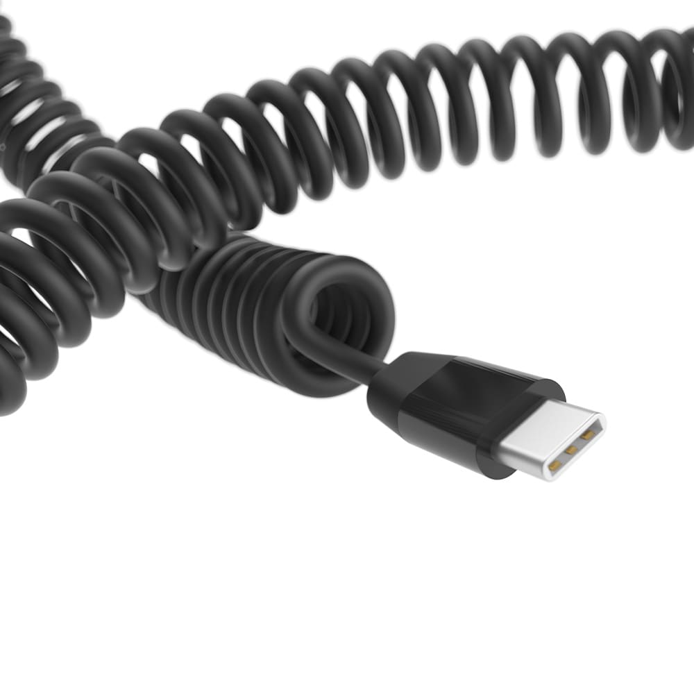 A coiled black charging cable with a USB connector at one end, featuring an organised design.