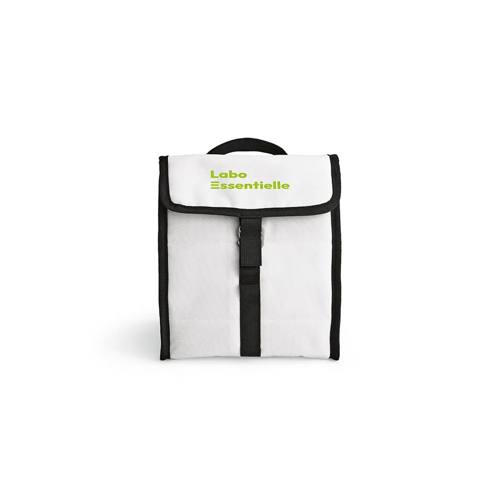 A cooler bag in white with black accents and a green logo on the front, featuring a roll top and handle.