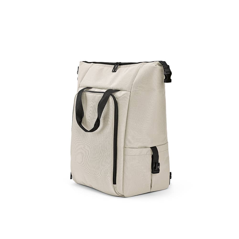 A beige cooler bag with a front pocket and two side pockets. It features a sturdy handle and has a logo.