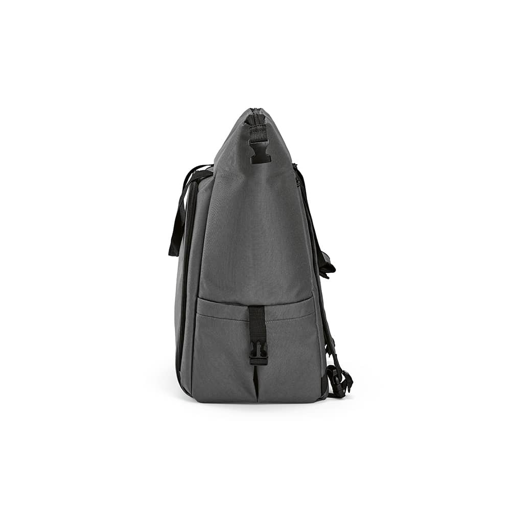 A grey cooler bag with a front pocket and two side pockets, featuring a strap and a zip closure.