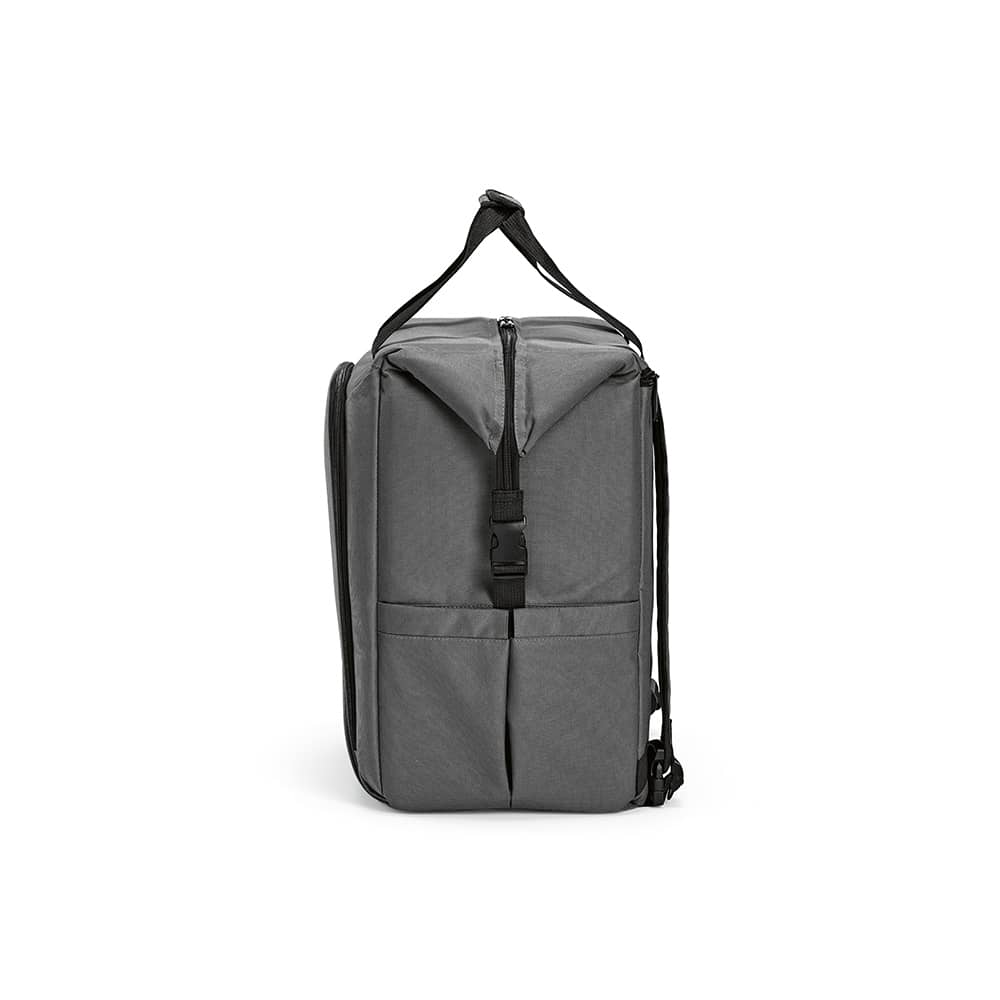 A grey cooler bag with a zippered top, front pocket, and two side pockets. It features a shoulder strap and logo.