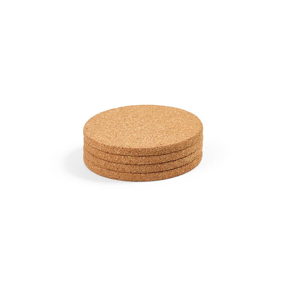 A set of four round cork coasters stacked on top of each other, featuring a natural cork finish.