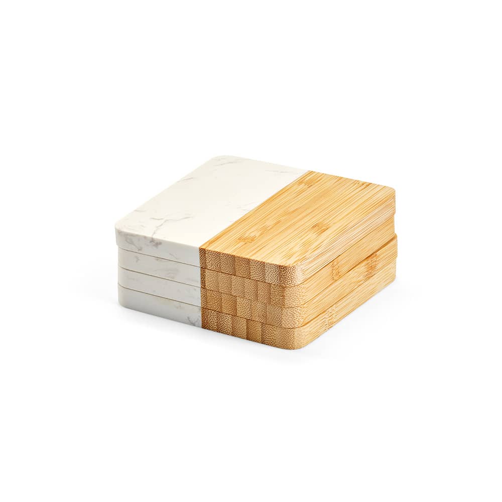 A set of four coasters featuring marble and bamboo, with a mix of white and natural wood tones.