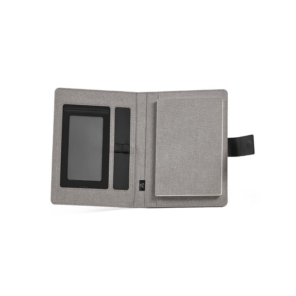 A grey A5 folder featuring a notepad and a closure, with an interior pocket and strap for holding items.