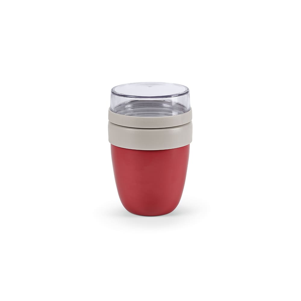 A drink bottle with a red body and grey lid, featuring two compartments and a clear top section.