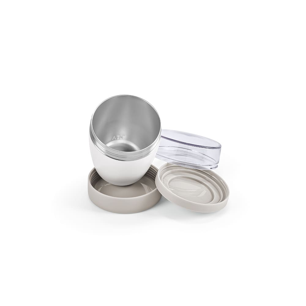 A food flask in silver with two compartments and a beige base, featuring a transparent lid. It has a logo.