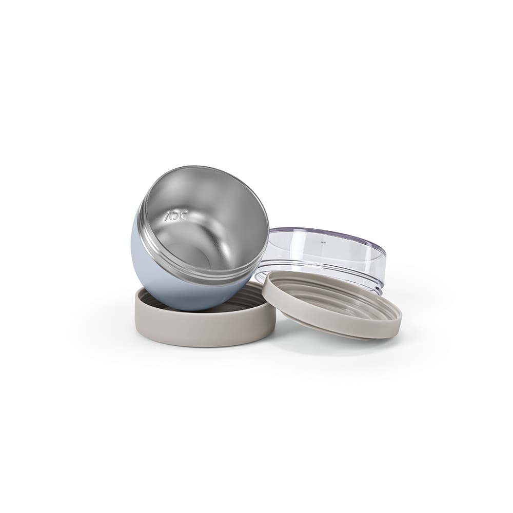 A food flask featuring a light blue exterior with two compartments and a transparent lid. It has a branding logo.